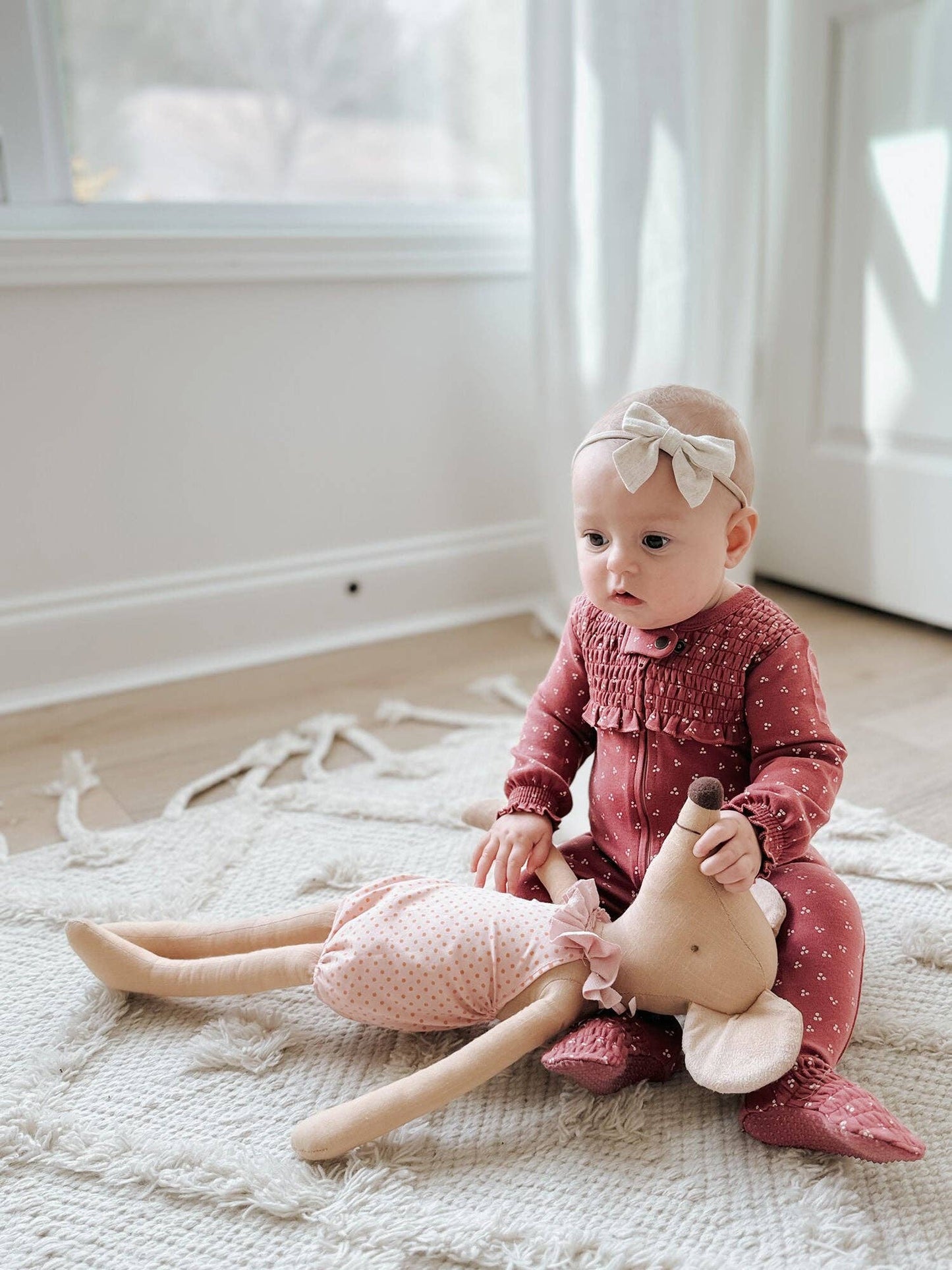 Organic Smocked Zipper Footie in Appleberry Dots