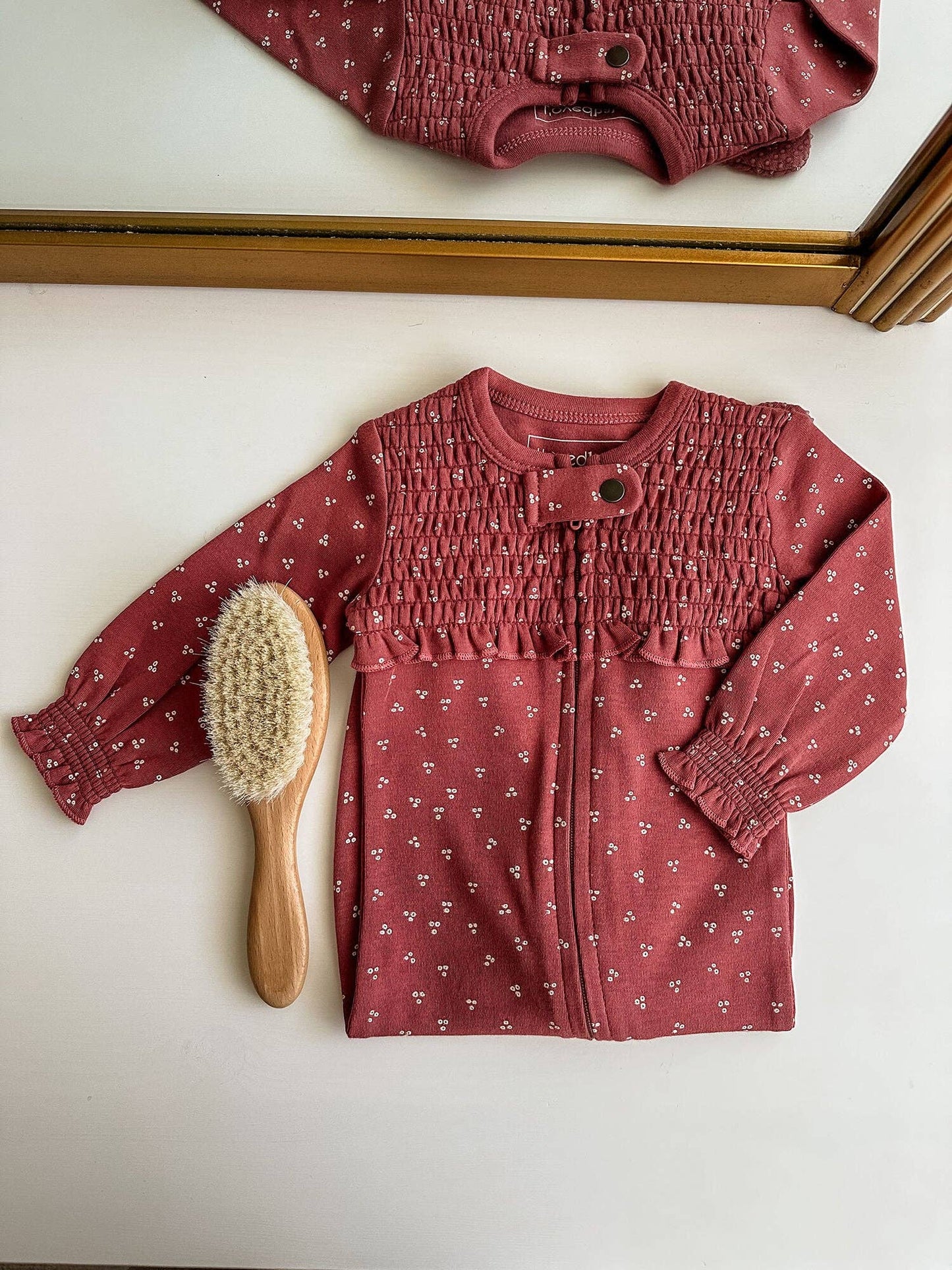 Organic Smocked Zipper Footie in Appleberry Dots